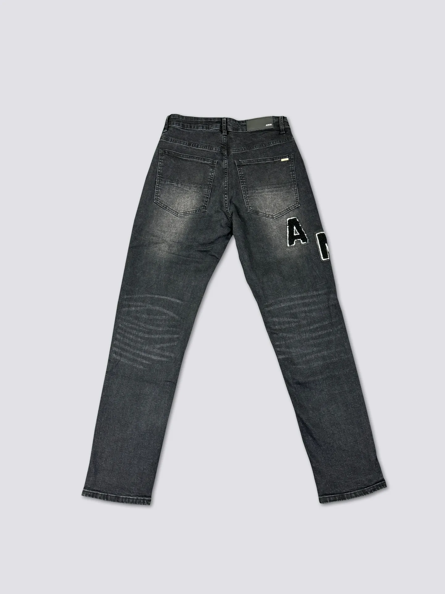 AMIRI's new jeans washed towel embroidered logo denim trousers are the same for men and women Color: Black Size: S-XL (28-34)
