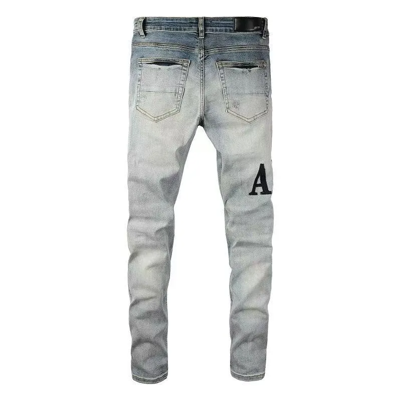 #M11 P168💰 AMIRI patch embroidery jeans trousers AMIRI high street basic ripped tight elastic jeans trousers amiri brand jeans break the production process and cutting of the original jeans, the fabrics are softer and more comfortable Hand-sewn collar label Customized logo buttons Genuine leather tag Color: Picture color Size: 30-32-34-36