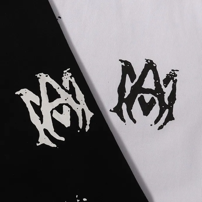 Style number: 713 P126 Fabric: 260g double yarn AMIRI 2025 spring and summer new logo round neck T-shirt high street men and women loose classic letter splash ink short sleeves Color: black. White Size: S M L XL