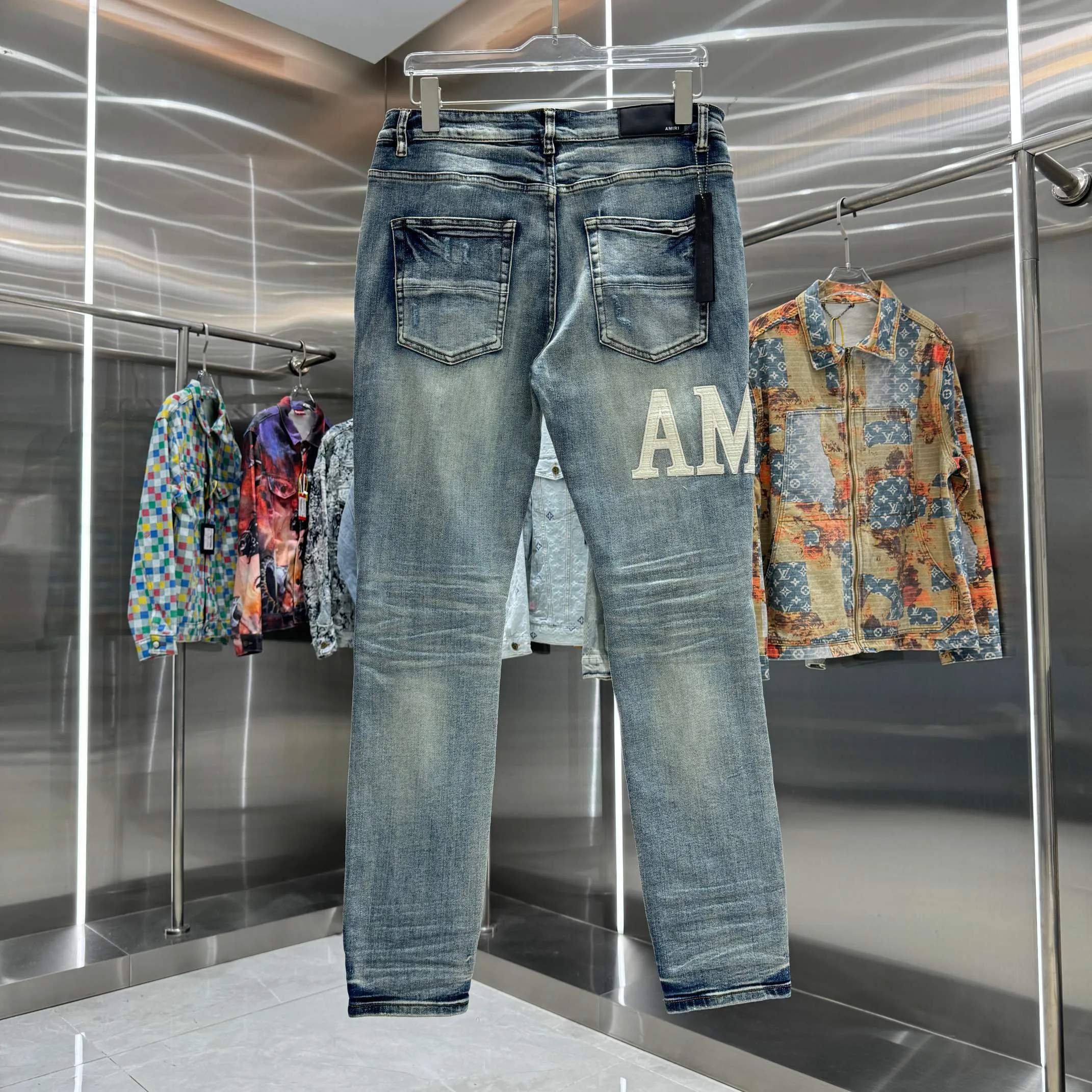 P290 Amiri ripped leather letter embroidery craft street fashion slim fit stretch jeans color blue size 30 32 34 36 38