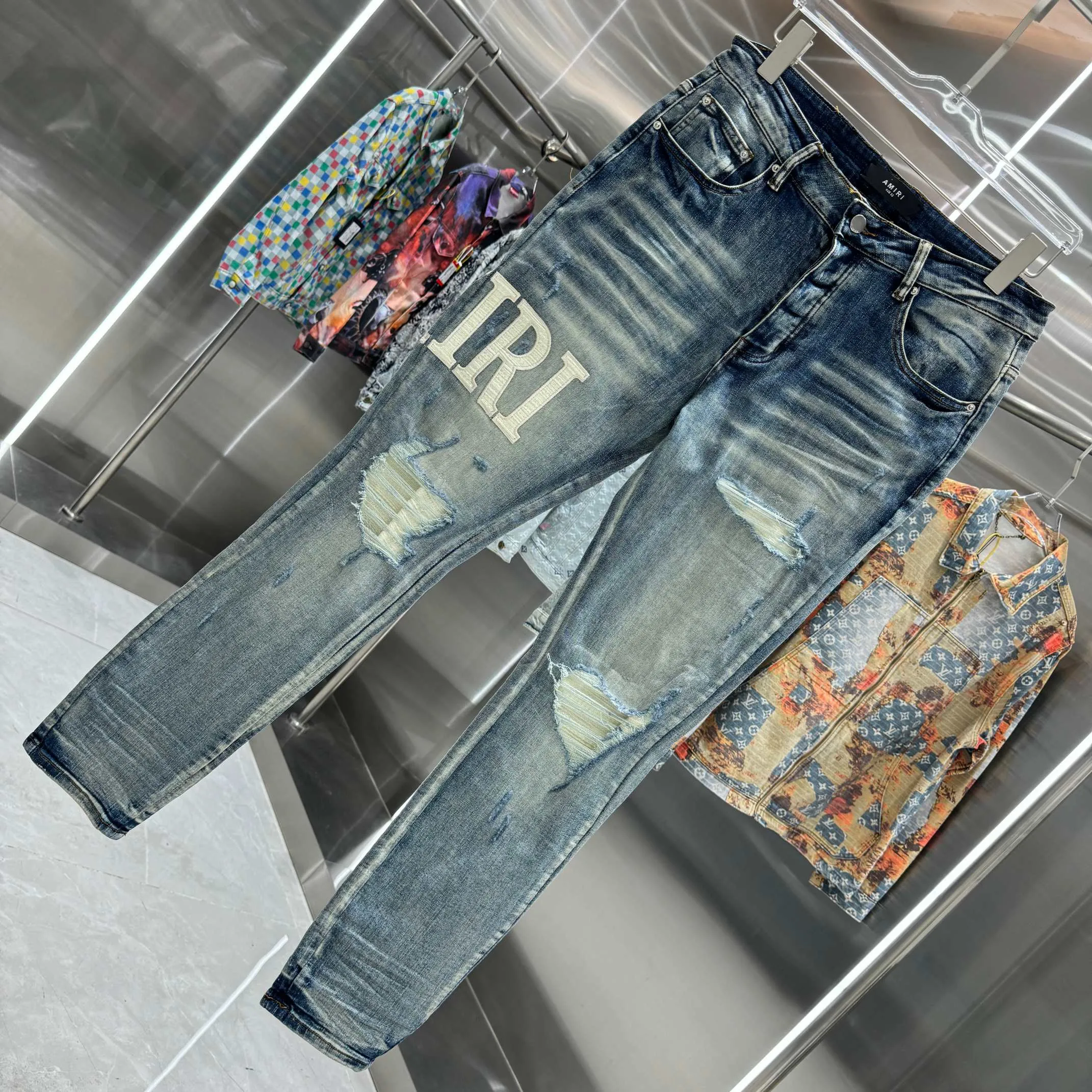 P290 Amiri ripped leather letter embroidery craft street fashion slim fit stretch jeans color blue size 30 32 34 36 38