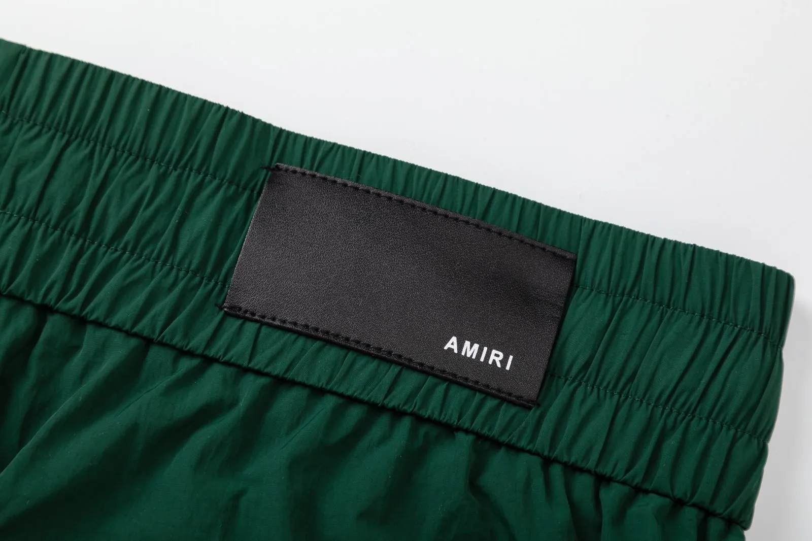 DK018#P230, AMIRI lettering film logo, cool and skin-friendly casual sports beach pants, color: black, dark green, size: S M L XL