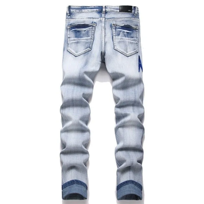 #M94 P168💰 AMIRI patch embroidery jeans trousers AMIRI high street basic ripped tight elastic jeans trousers amiri brand jeans break the production process and cutting of the original jeans, the fabrics are softer and more comfortable Hand-sewn collar label Customized logo buttons Genuine leather tag Color: Picture color Size: 30-32-34-36