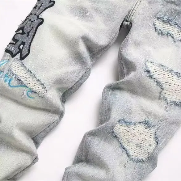 #M56 P168💰 AMIRI patch embroidery jeans trousers AMIRI high street basic ripped tight elastic jeans trousers amiri brand jeans break the production process and cutting of the original jeans, the fabrics are softer and more comfortable Hand-sewn collar label Customized logo buttons Genuine leather tag Color: Picture color Size: 30-32-34-36