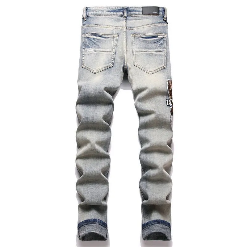 #M74 P168💰 AMIRI patch embroidery jeans trousers AMIRI high street basic ripped tight elastic jeans trousers amiri brand jeans break the production process and cutting of the original jeans, the fabrics are softer and more comfortable Hand-sewn collar label Customized logo buttons Genuine leather tag Color: Picture color Size: 30-32-34-36