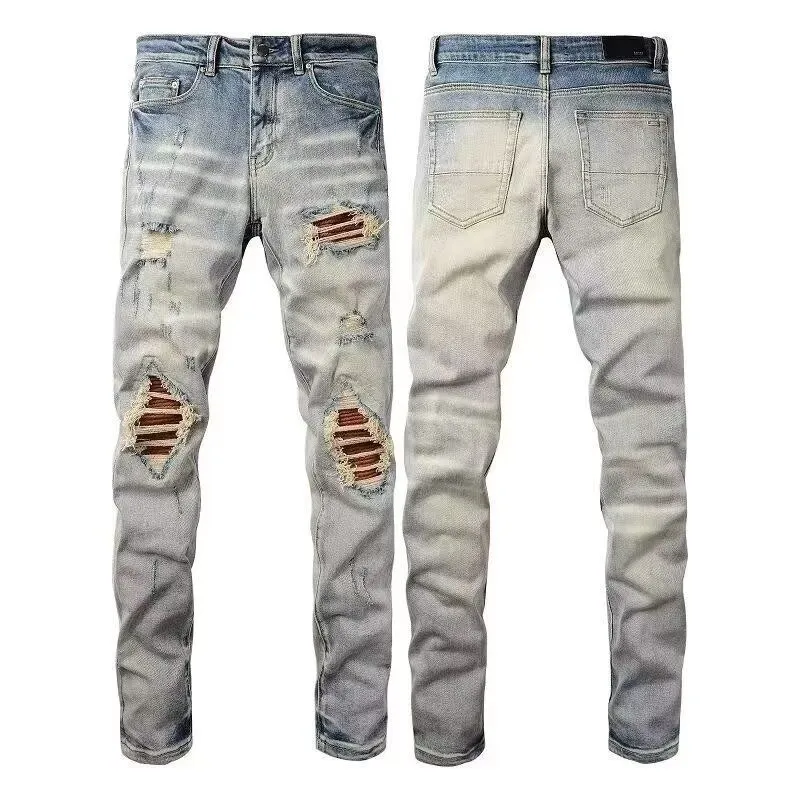 P168 💰 AMIRI patch embroidery jeans trousers AMIRI high street basic ripped tight elastic jeans trousers amiri brand jeans break the production process and cutting of the original jeans, the fabrics are softer and more comfortable Hand-sewn collar label Customized logo buttons Genuine leather tag Color: Picture color Size: 30-32-34-36