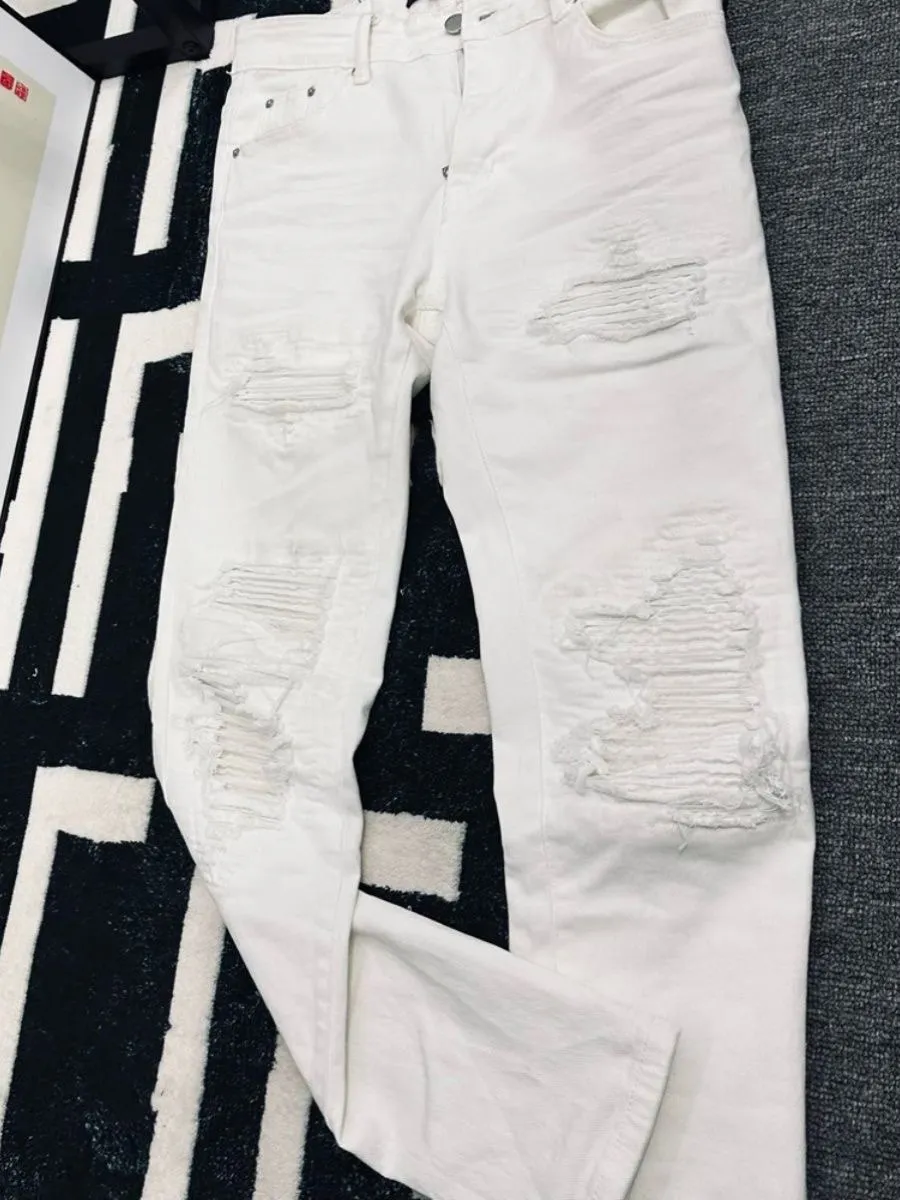 P166 amiri high street ripped patched jeans trousers amiri ripped tight stretch jeans trousers amiri hot diamonds amiri is transliterated as Emil, which is the name of the founder. mikeamiri, the founder of amiri, grew up in Los Angeles, USA. He was influenced by the local street culture RO since he was a child, so he founded the amiri brand named after himself. A variety of trendy clothing meets the needs of different trendy players. Amiri clothing has novel and unique styles and is a well-known street brand in the United States. The styles and styles of many clothes are loved by many street photographers. The various clothing styles meet the dressing needs of different people, show their unique temperament, and show the trend of dressing. amiri's jeans are relatively famous. Not only do they have many styles, but the quality of the jeans is also very good. Many celebrities have also worn amiri brand jeans. Size: M-XXL