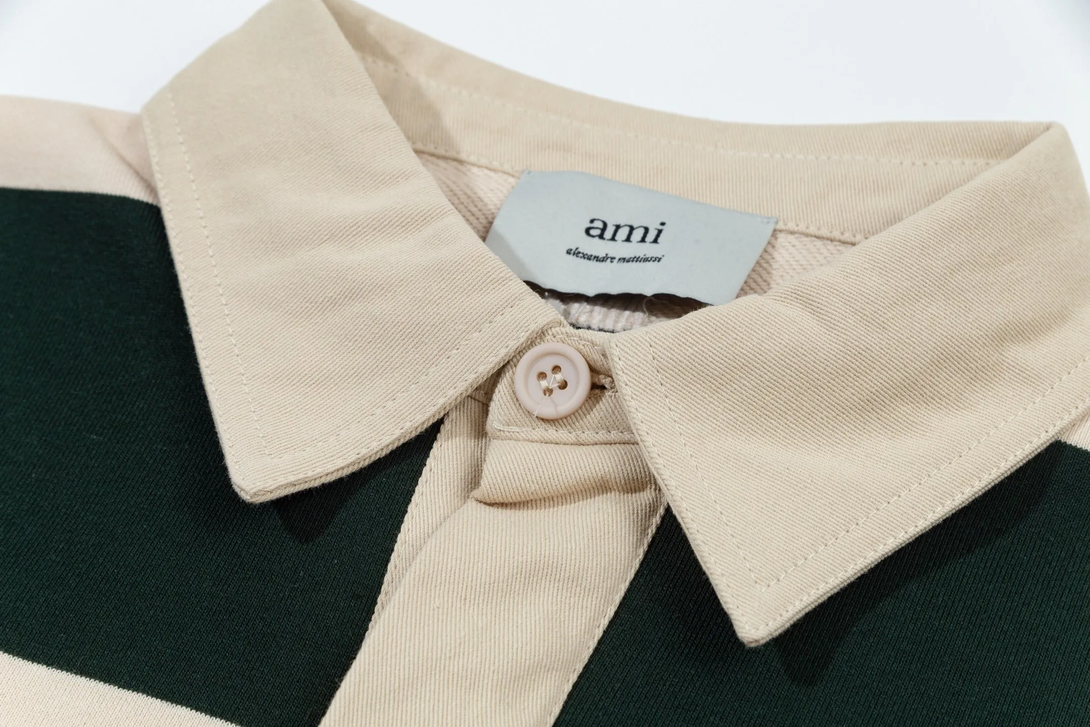 662# AMI Paris [Co-branded by Choi Woo-sik] Co-branded logo WDC contrasting logo woven ADC stripes POL collar embroidery on the chest Cotton solid color long-sleeved Oxford shirt collar sweatshirt material Customized from the original board 280g pure cotton fabric YP customized Loose fit Uniform style for men and women Color: Dark green/Apricot Size S-XL