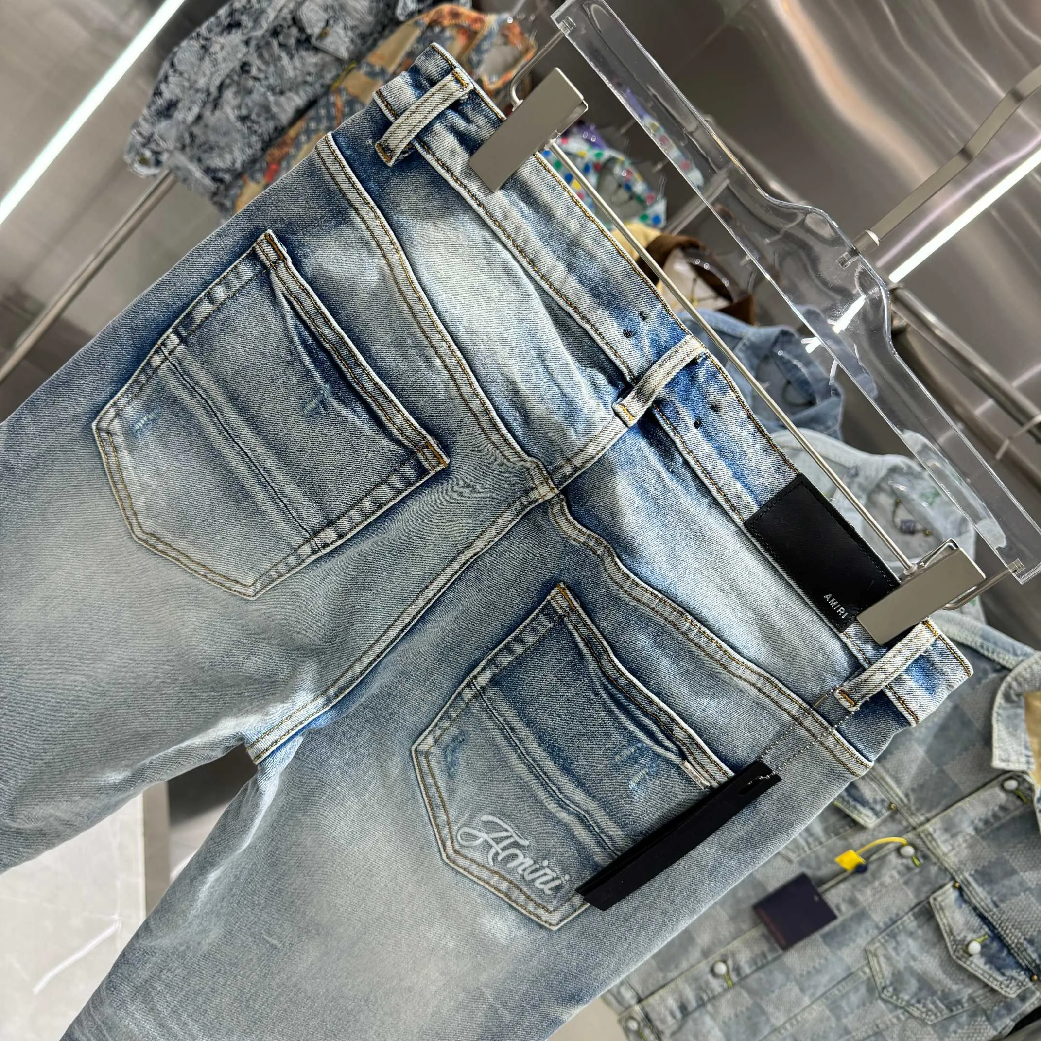 P290 Amiri ripped back pocket letter embroidery street fashion slim fit stretch jeans Color light blue Size 30 32 34 36 38
