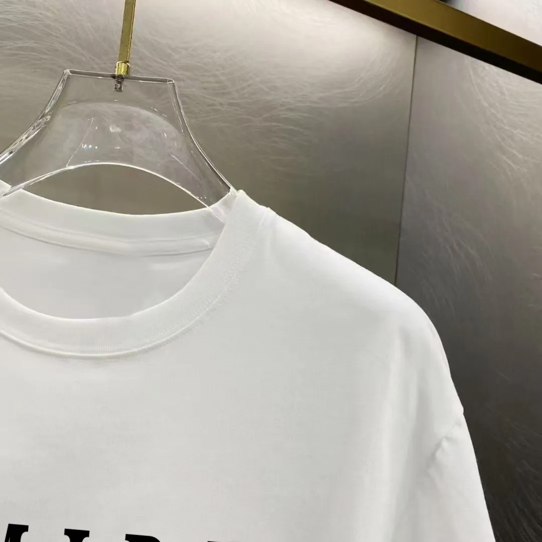 P140 AMIRI 2025 early spring new style debut counter latest short-sleeved round neck T-shirt, high-end custom design, avant-garde and fashionable! High-end customized high-count long-staple cotton fabric. Comfortable to wear. Exquisite counter-level stitching. Fine workmanship. The upper body effect is incomparably handsome! A must-have item for a stylish man! Size: S M L