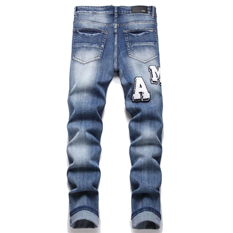 P196 Top replica AMIRI jeans trousers AMIRI high street basic ripped tight stretch jeans trousers Amiriamiri is transliterated as Emil, which is the name of the founder. Mike Amiri, the founder of amiri, grew up in Los Angeles, USA. He was influenced by the local street culture Rock since he was a child, so he founded the amiri brand named after himself. A variety of trendy brand clothing meets the needs of different fashion players. Amiri clothing has novel and unique styles and is a well-known street brand in the United States. Many of its styles and styles are loved by many street photographers. Various clothing styles meet the needs of different people, show their unique temperament, and show the trend of dressing. amiri's jeans are relatively famous. Not only do they have many styles, but the quality of the jeans is also very good. Many celebrities have also worn amiri brand jeans.  The jeans of the amiri brand break through the production process and cutting of the original jeans. The fabrics are relatively soft and comfortable, and are not as hard as some jeans, which can irritate the skin and cause the skin to bleed when worn. Los Angeles trendy brand Amiri's jeans are made with great detail from tailoring to texture, adding wrinkles, bullet holes, damage and other details to add to the trendiness of the jeans. You can choose the style that suits you according to your own needs. Only when you wear a suitable style can you have a certain sense of fashion.  In recent years, high street has become a word that appears more and more frequently in men's clothing. High street style has also become an important direction for everyone's matching. High street related items are basically inseparable from oversize or off-shoulder tops. The lower body is matched with trackpants or tight-fitting denim. In my opinion, the most representative one is perhaps annihilation. Color; picture color Size: m l xl xxl