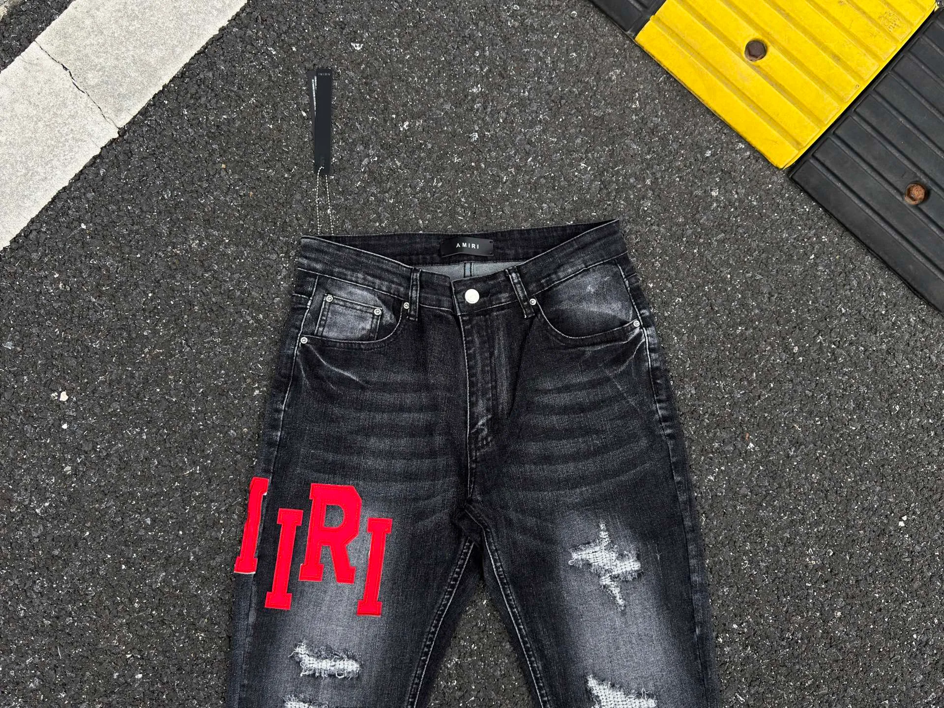 P240 💰AM01 AMIRI new jeans, washed ripped holes, whiskering leather denim trousers, same style for men and women Size: S-XL (28-34)