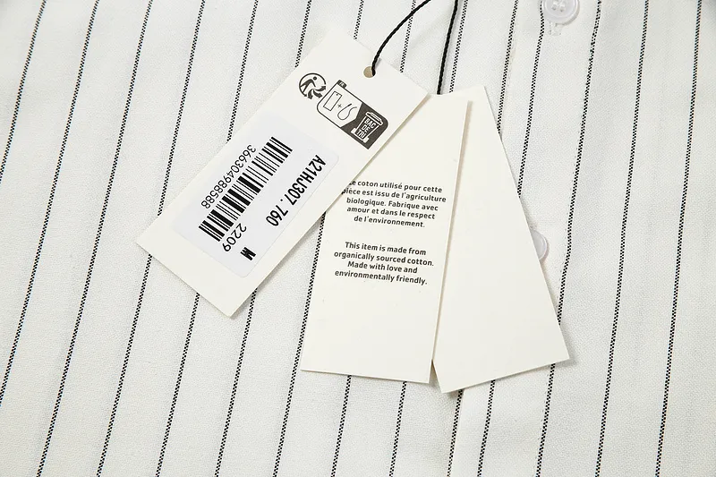 AMI Paris classic autumn red love heart embroidered on the chest. Casual cotton large striped short-sleeved Oxford shirt. Original custom-made 180g pure cotton fabric. Loose off-shoulder version. Same style for men and women. Color: black and white, blue and white. Size: S-XL.