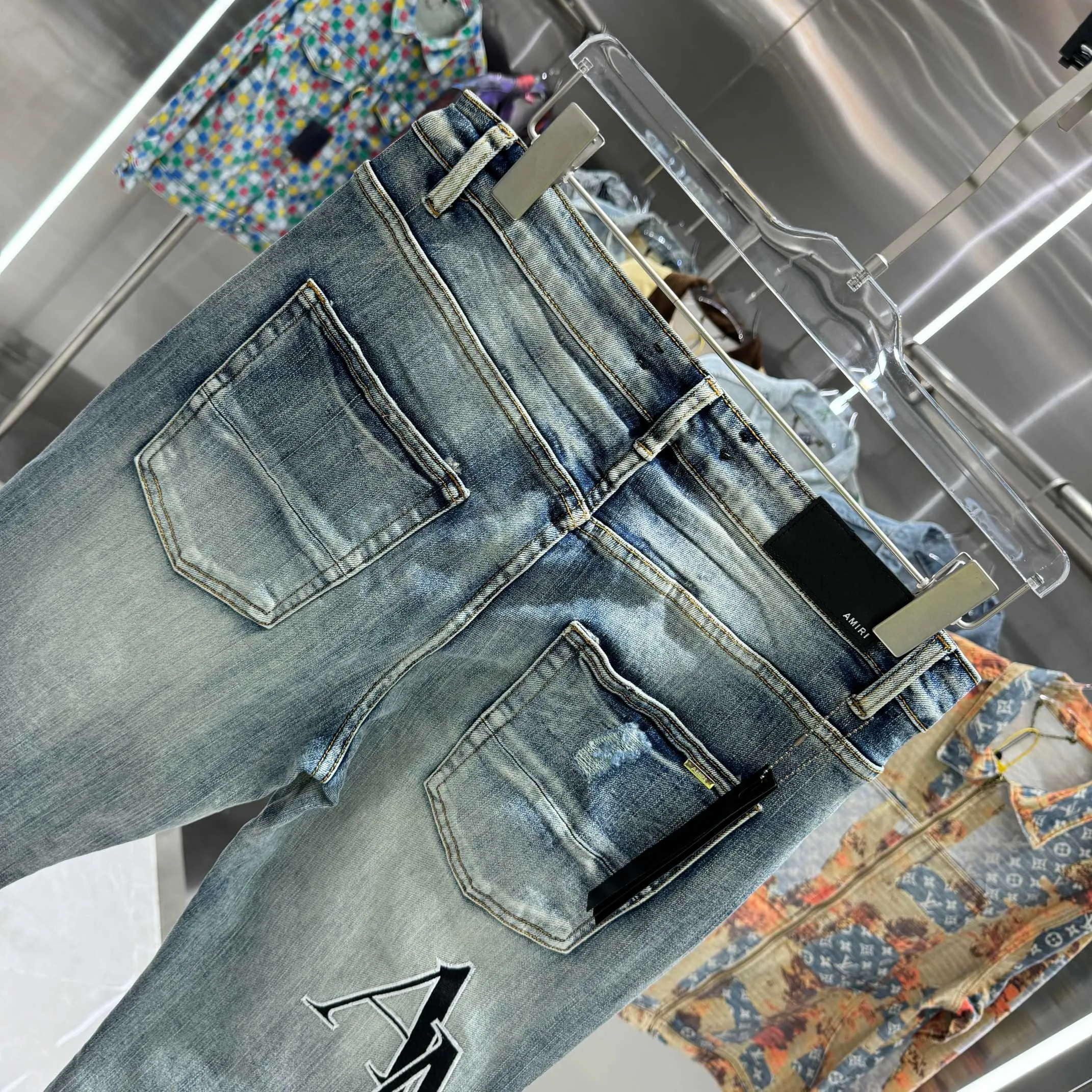 P280 Amiri ripped letter embroidery craft street fashion slim fit stretch jeans color blue size 30 32 34 36 38