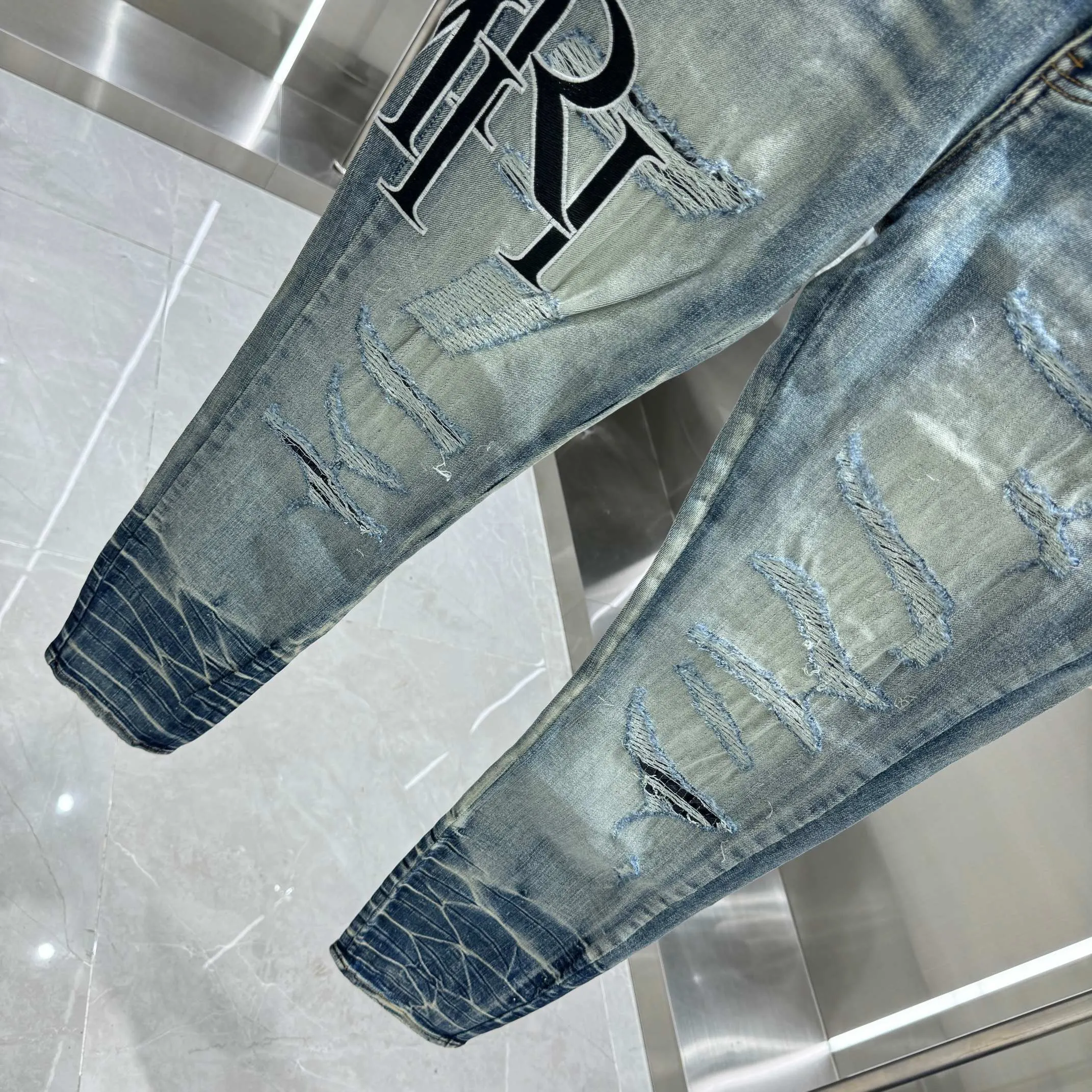 P280 Amiri ripped letter embroidery craft street fashion slim fit stretch jeans color blue size 30 32 34 36 38