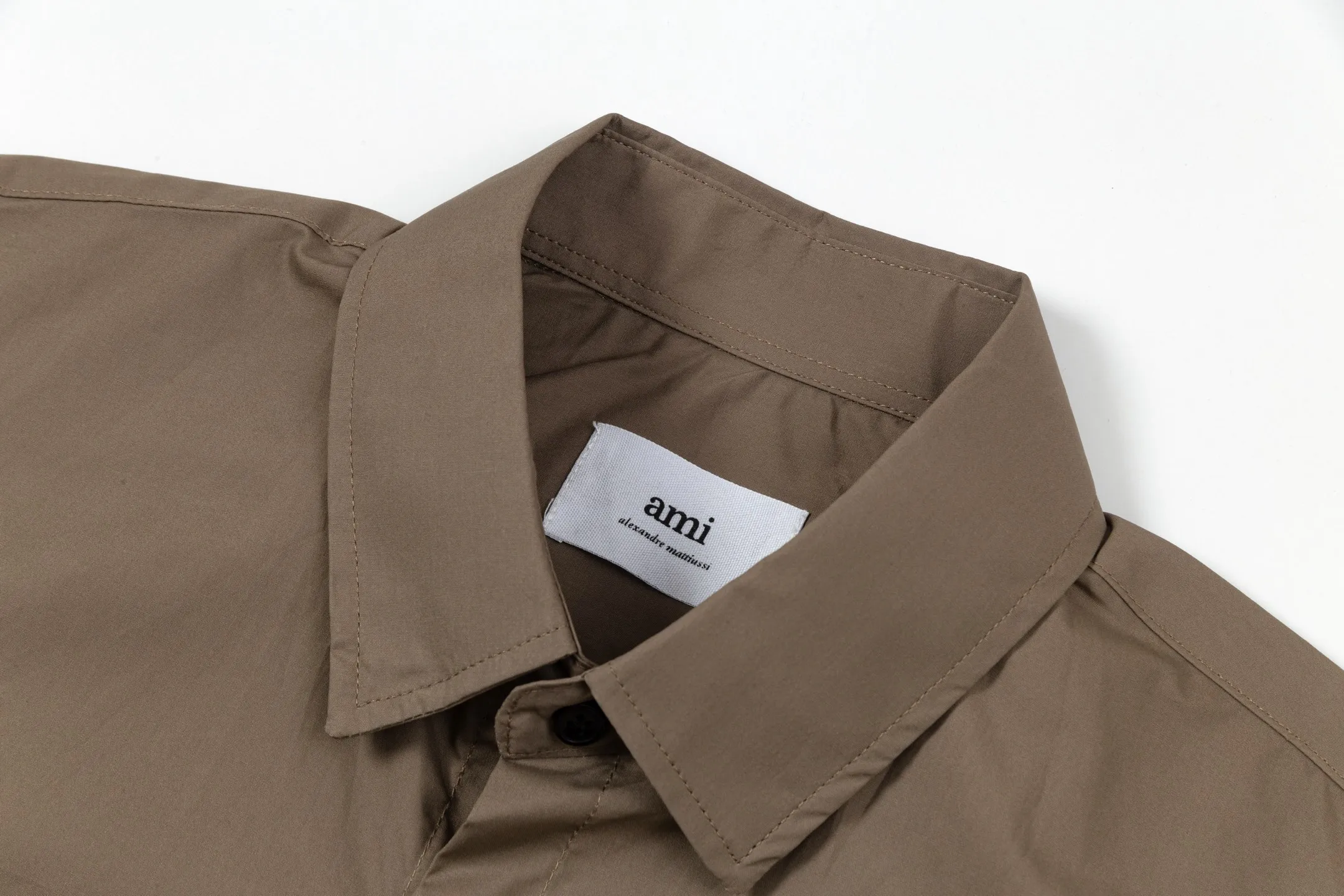 2212# AMI Paris Classic autumn chest pocket same color ADC love embroidered LOGO casual cotton solid color short sleeves Original customized 180g pure cotton fabric Loose off-shoulder version Same style for men and women Color: Black White Apricot Milk Tea Gray Size: S-XL
