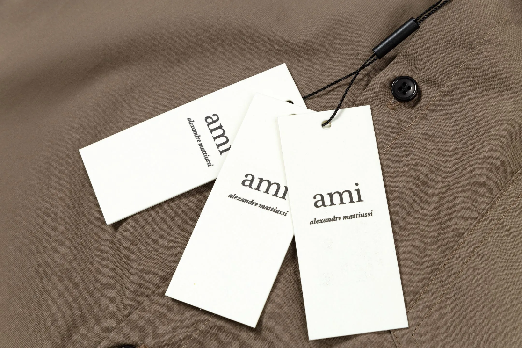 2212# AMI Paris Classic autumn chest pocket same color ADC love embroidered LOGO casual cotton solid color short sleeves Original customized 180g pure cotton fabric Loose off-shoulder version Same style for men and women Color: Black White Apricot Milk Tea Gray Size: S-XL