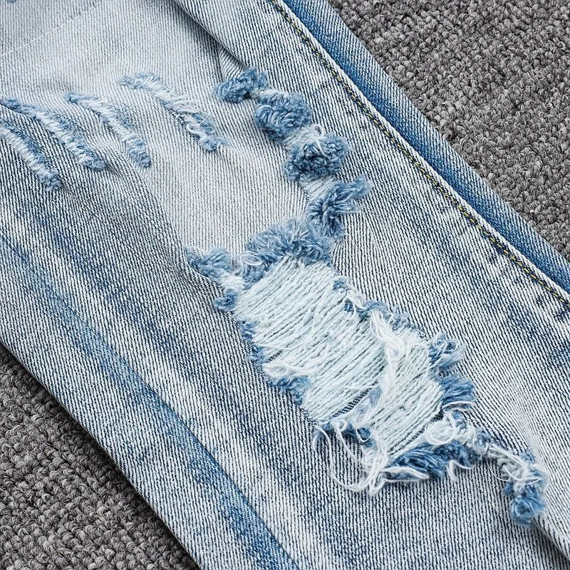 P270 💰 (Top Version) AMIRI Double Buff High Street Jeans Slim Fit Stretch Washed Knife Cut Hole Pants Men's Fashion AMIRI amiri is transliterated as Emil, which is the name of the founder. Mike Amiri, the founder of amiri, grew up in Los Angeles, USA. He was influenced by local street culture and Punk Rock since childhood, so he founded the amiri brand named after himself. A variety of trendy clothing meets the needs of different fashion players. Amiri clothing has novel and unique styles and is a well-known street brand in the United States. The styles and styles of many clothes are loved by many street photographers. The various clothing styles meet the dressing needs of different people, show their unique temperament, and show the trend of dressing. amiri's jeans are relatively famous. Not only do they have many styles, but the quality of the jeans is also very good. Many celebrities have also worn amiri brand jeans. Color: Picture color Size: 28, 30, 32, 34, 36 28 30 32 34 36 Waist 71 76 81 86 91 Qianlang 26.5 27.5 28.5 29.5 30.5 Hou Lang 37 38 39 40 41 Foot 14 14.8 15.6 16.4 17.2 Foreign Minister 100 102 104 106 107