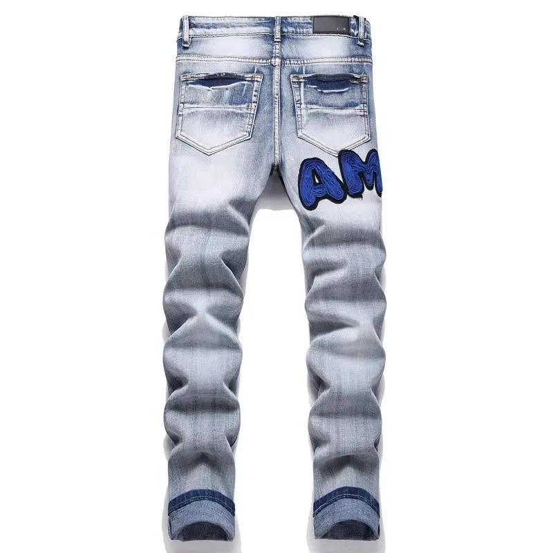 #M19 P168💰 Amiri classic embroidered patched leather ripped letter jeans, slim fit jeans, produced by a major washed factory, full of high-end feel, partially destroyed knee design with patchwork leather design, has been used as a facade design, leather waist nameplate, the focus of this style is not on the washing, but on the destroyed shape and version. The secret lies in the craftsmanship of the master. The cost of post-processing, grinding, cutting, etc. is far beyond the cost of assembly line products. Color: Picture color Size: 30-32-34-36