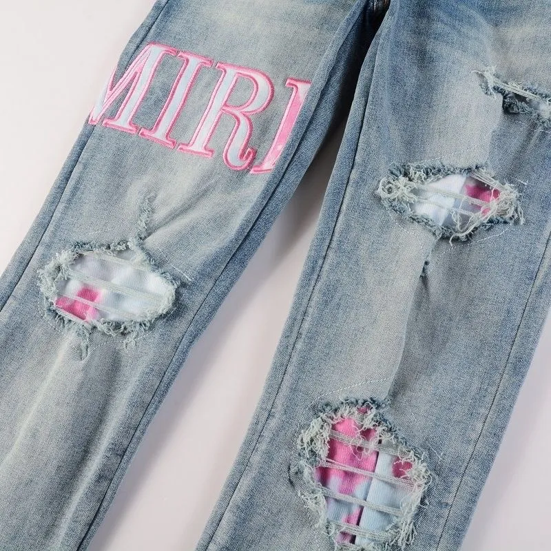 P180 Top replica AMIRI splash-ink medal patch embroidered jeans trousers AMIRI high street basic ripped tight stretch jeans trousers Amiriamiri is transliterated as Emil, which is the name of the founder. Mike Amiri, the founder of amiri, grew up in Los Angeles, USA. He was influenced by the local street culture Rock since he was a child, so he founded the amiri brand named after himself. A variety of trendy brand clothing meets the needs of different fashion players. Amiri clothing has novel and unique styles and is a well-known street brand in the United States. Many of its styles and styles are loved by many street photographers. Various clothing styles meet the needs of different people, show their unique temperament, and show the trend of dressing. amiri's jeans are relatively famous. Not only do they have many styles, but the quality of the jeans is also very good. Many celebrities have also worn amiri brand jeans.  The jeans of the amiri brand break through the production process and cutting of the original jeans. The fabrics are relatively soft and comfortable, and are not as hard as some jeans, which can irritate the skin and cause the skin to bleed when worn. Los Angeles trendy brand Amiri's jeans are made with great detail from tailoring to texture, adding wrinkles, bullet holes, damage and other details to add to the trendiness of the jeans. You can choose the style that suits you according to your own needs. Only when you wear a suitable style can you have a certain sense of fashion.  In recent years, high street has become a word that appears more and more frequently in men's clothing. High street style has also become an important direction for everyone's matching. High street related items are basically inseparable from oversize or off-shoulder tops. The lower body is matched with trackpants or tight-fitting denim. In my opinion, the most representative one is perhaps annihilation. Color; picture color Size: m l xl xxl