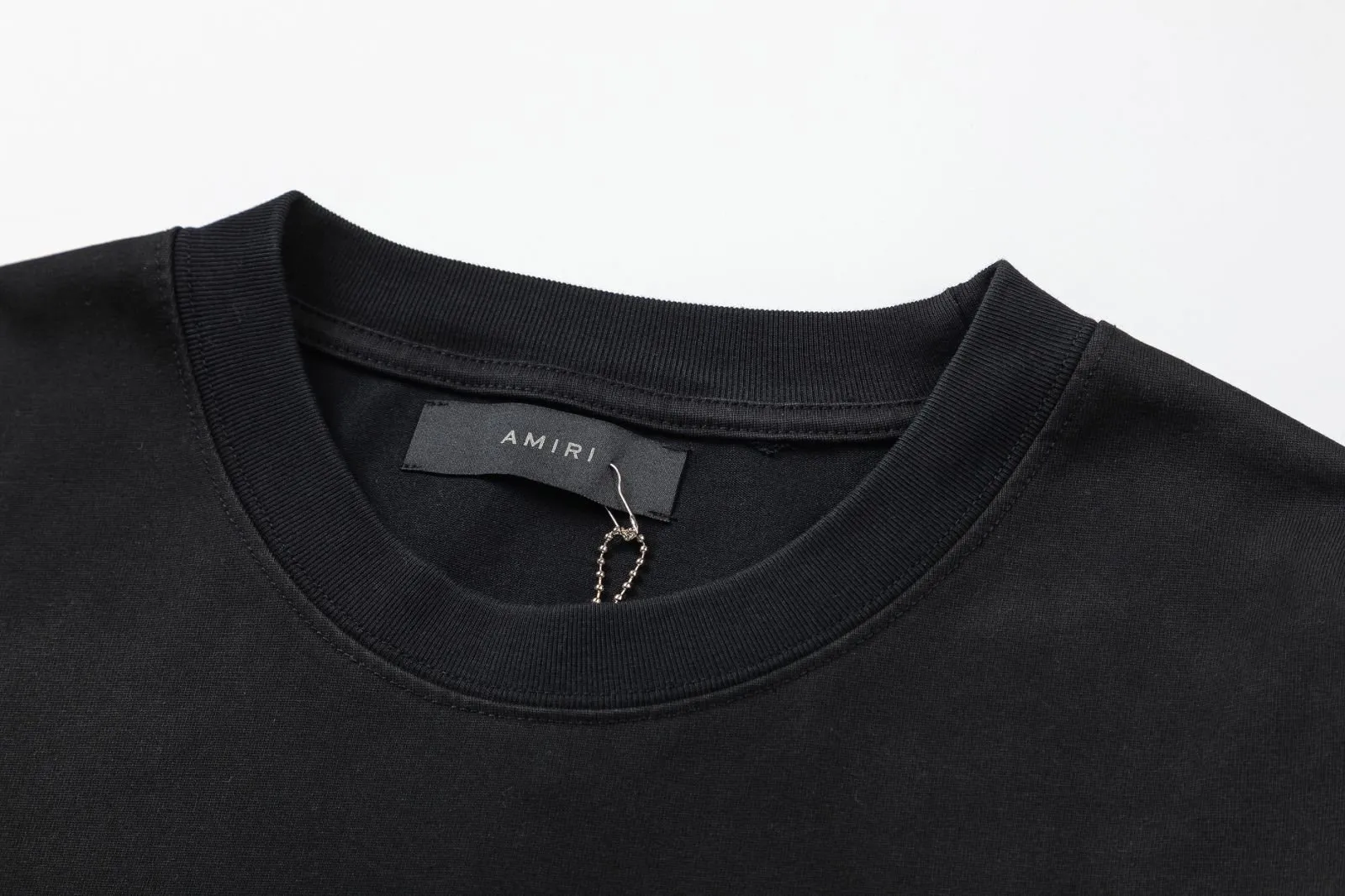 8009#P150amiri washed model with cracked printed logo, made of 300g fabric, color: black. Size: S M L XL