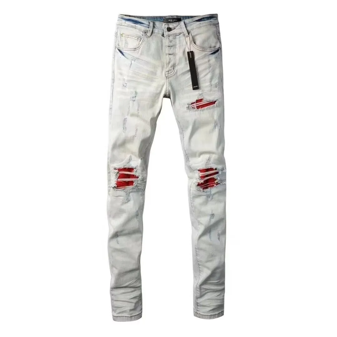 ￼#M16 P168💰 AMIRI patch embroidery jeans trousers AMIRI high street basic ripped tight elastic jeans trousers amiri brand jeans break the production process and cutting of the original jeans, the fabrics are softer and more comfortable Hand-sewn collar label Customized logo buttons Genuine leather tag Color: Picture color Size: 30-32-34-36