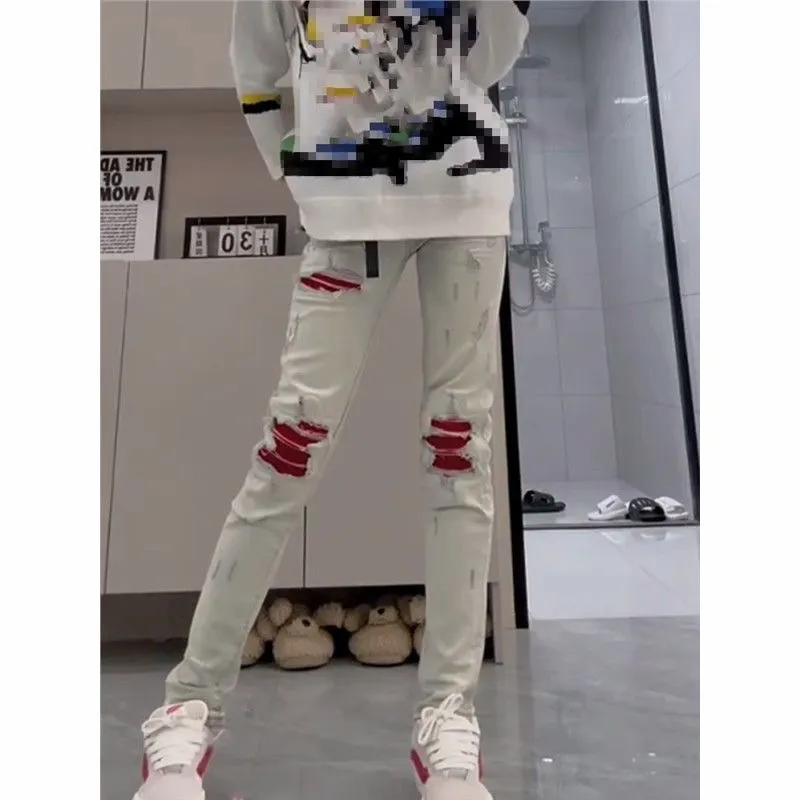 ￼#M16 P168💰 AMIRI patch embroidery jeans trousers AMIRI high street basic ripped tight elastic jeans trousers amiri brand jeans break the production process and cutting of the original jeans, the fabrics are softer and more comfortable Hand-sewn collar label Customized logo buttons Genuine leather tag Color: Picture color Size: 30-32-34-36