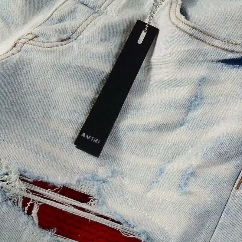 ￼#M16 P168💰 AMIRI patch embroidery jeans trousers AMIRI high street basic ripped tight elastic jeans trousers amiri brand jeans break the production process and cutting of the original jeans, the fabrics are softer and more comfortable Hand-sewn collar label Customized logo buttons Genuine leather tag Color: Picture color Size: 30-32-34-36