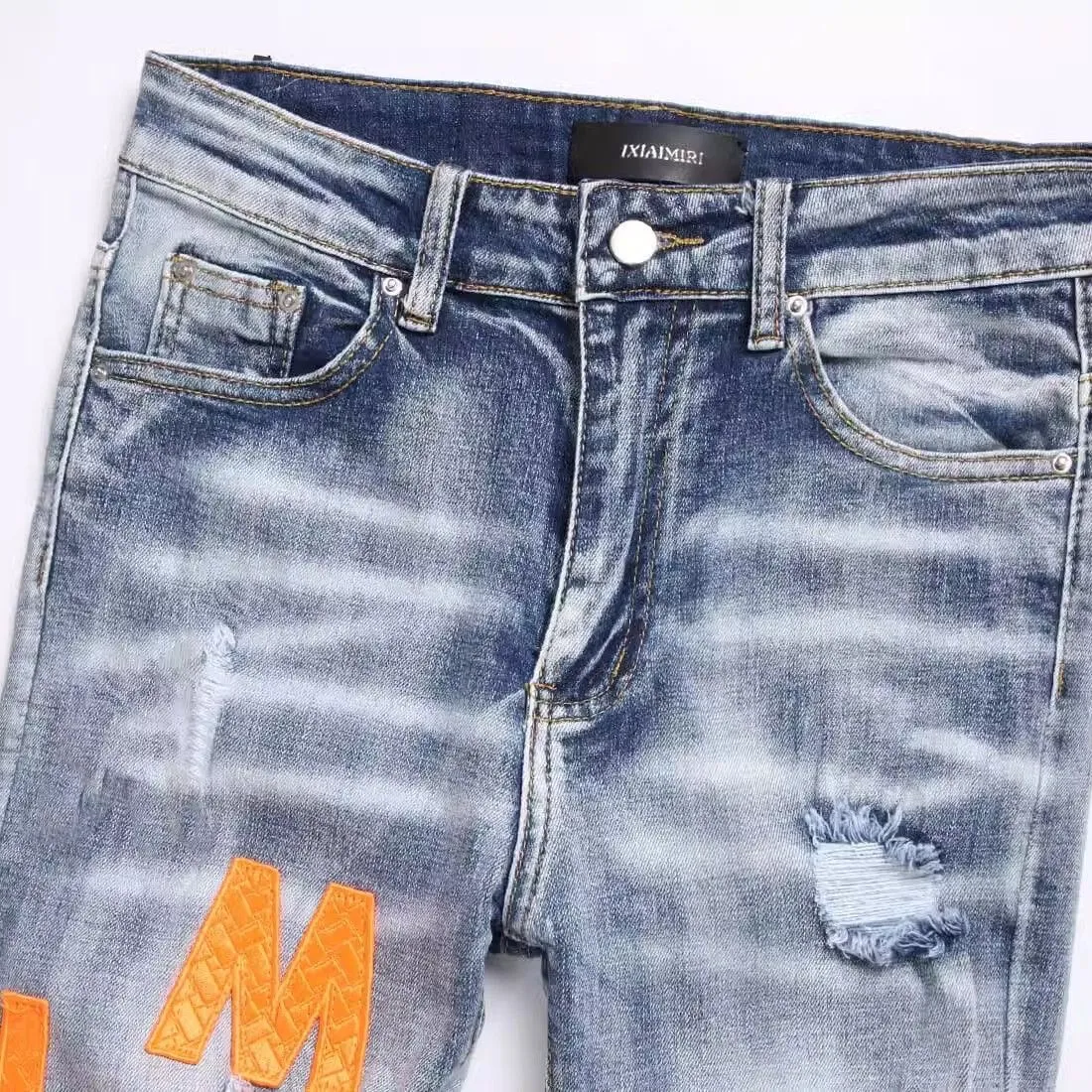 #M38 P168💰 Amiri classic embroidered leather ripped letter jeans slim fit jeans. Produced by a major washed factory. Full of high-end. Knee part destroyed design with patchwork design. Already used as facade design. Leather waist nameplate. The focus of this style is not on washing, but on the destroyed shape and version. The secret lies in the craftsmanship of the master. The cost of post-processing, grinding, cutting, etc. is far beyond the cost of assembly line products. Color: Picture color Size: 30-32-34-36
