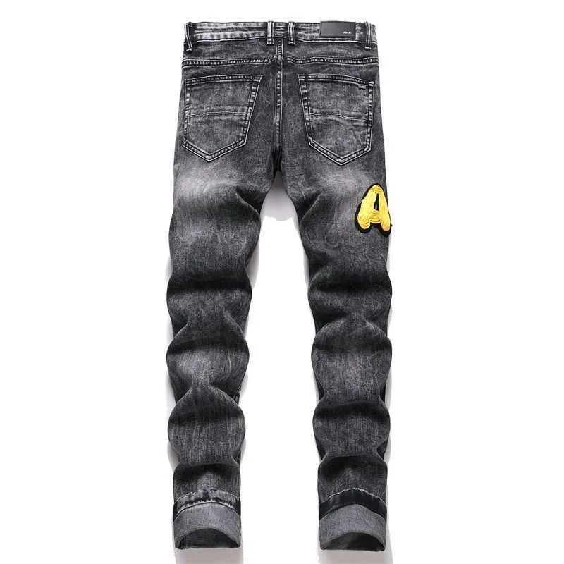 #M83 P168💰 AMIRI patch embroidery jeans trousers AMIRI high street basic ripped tight elastic jeans trousers amiri brand jeans break the production process and cutting of the original jeans, the fabrics are softer and more comfortable Hand-sewn collar label Customized logo buttons Genuine leather tag Color: Picture color Size: 30-32-34-36