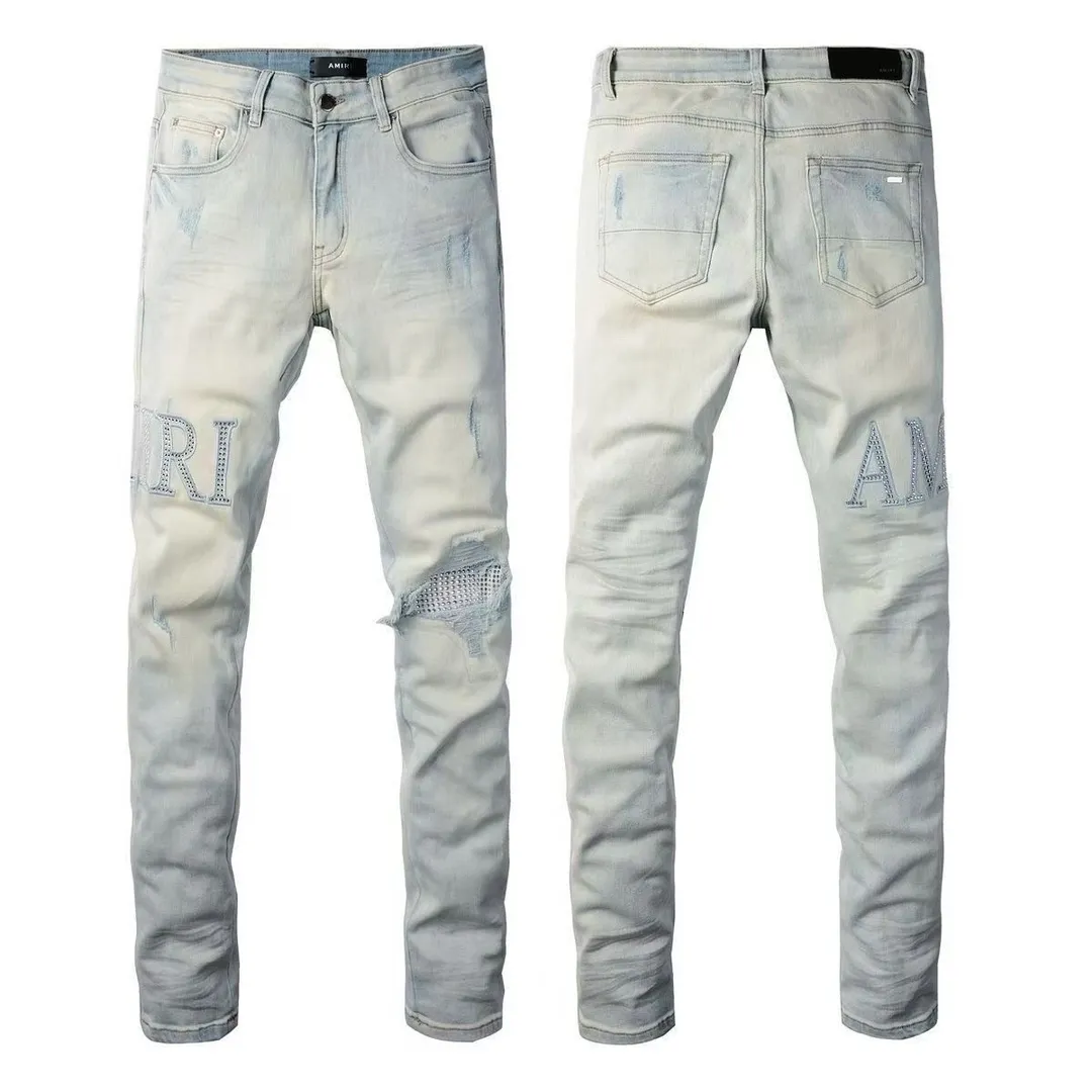 P156 model number Cc818 AMIRI white ripped high street jeans with diamonds! The transliteration of amiri is Emil, which is the name of the founder. Mike Amiri, the founder of amiri, grew up in Los Angeles, USA. He was influenced by local street culture and Punk Rock since he was a child, so he founded the amiri brand named after himself. A variety of trendy clothing meets the needs of different fashion players. Amiri clothing has novel and unique styles and is a well-known street brand in the United States. The styles and styles of many clothes are loved by many street photographers. The various clothing styles meet the dressing needs of different people, show their unique temperament, and show the trend of dressing. amiri's jeans are relatively famous. Not only do they have many styles, but the quality of their denim jackets is also very good. Many celebrities have also worn the amiri brand's denim series. The fabric is made of 100% cotton denim! High temperature setting, heavy sand washing, never fade, full of fashion! All made to order! -The colorful embroidery on the chest is so tense and the embroidery is neat! Imported machine for work! quality assurance!  -The entire garment is made with fine workmanship. Each seam is pressed using a double-needle machine. This stitching is a test of the workers' skills. If it goes astray, the entire garment will be scrapped. The hardware is custom-made, with exclusive logos, and is a one-to-one replica of the original! Original trademark! The fit is loose and slimming! Color: Picture color Size: m-2xl
