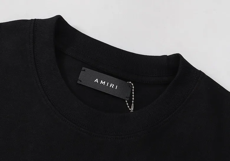 Style number: 674 P120 Fabric: 260g double yarn AMIRI 2025 spring and summer new logo round neck T-shirt high street men and women loose classic letter flower short sleeves Color: White Black Size: S M L XL