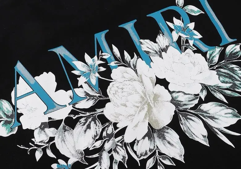 Style number: 674 P120 Fabric: 260g double yarn AMIRI 2025 spring and summer new logo round neck T-shirt high street men and women loose classic letter flower short sleeves Color: White Black Size: S M L XL