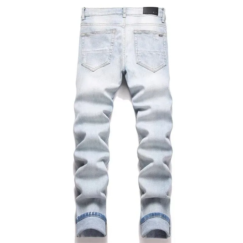 P168 💰 AMIRI patch embroidery jeans trousers AMIRI high street basic ripped tight elastic jeans trousers amiri brand jeans break the production process and cutting of the original jeans, the fabrics are softer and more comfortable Hand-sewn collar label Customized logo buttons Genuine leather tag Color: Picture color Size: 30-32-34-36