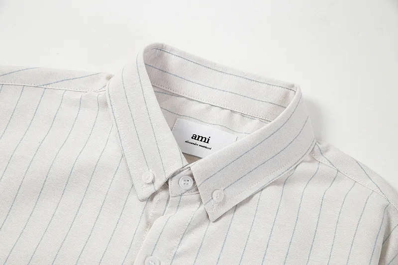 AMI Paris classic autumn red love heart embroidered on the chest, casual cotton large striped long-sleeved Oxford shirt, original custom-made 180g pure cotton fabric, loose off-shoulder version, same style for men and women, color: black and white, blue and white, size: S-XL