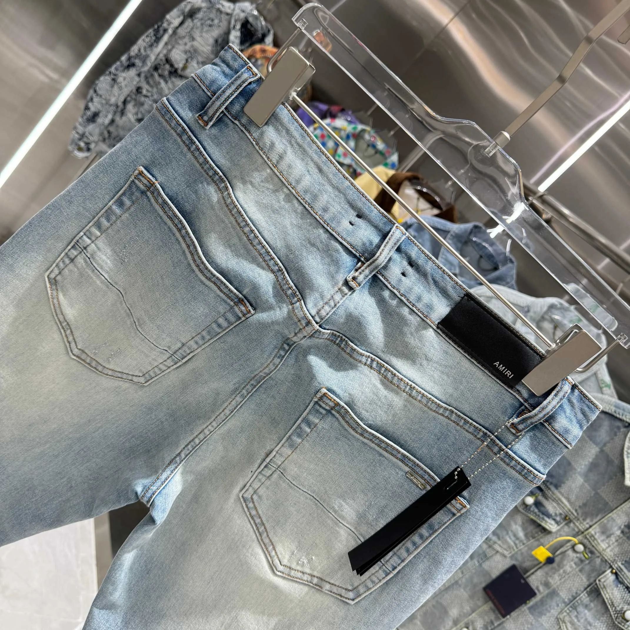 P290 Amiri ripped patch pattern embroidered street fashion slim fit stretch jeans Color light blue Size 30 32 34 36 38