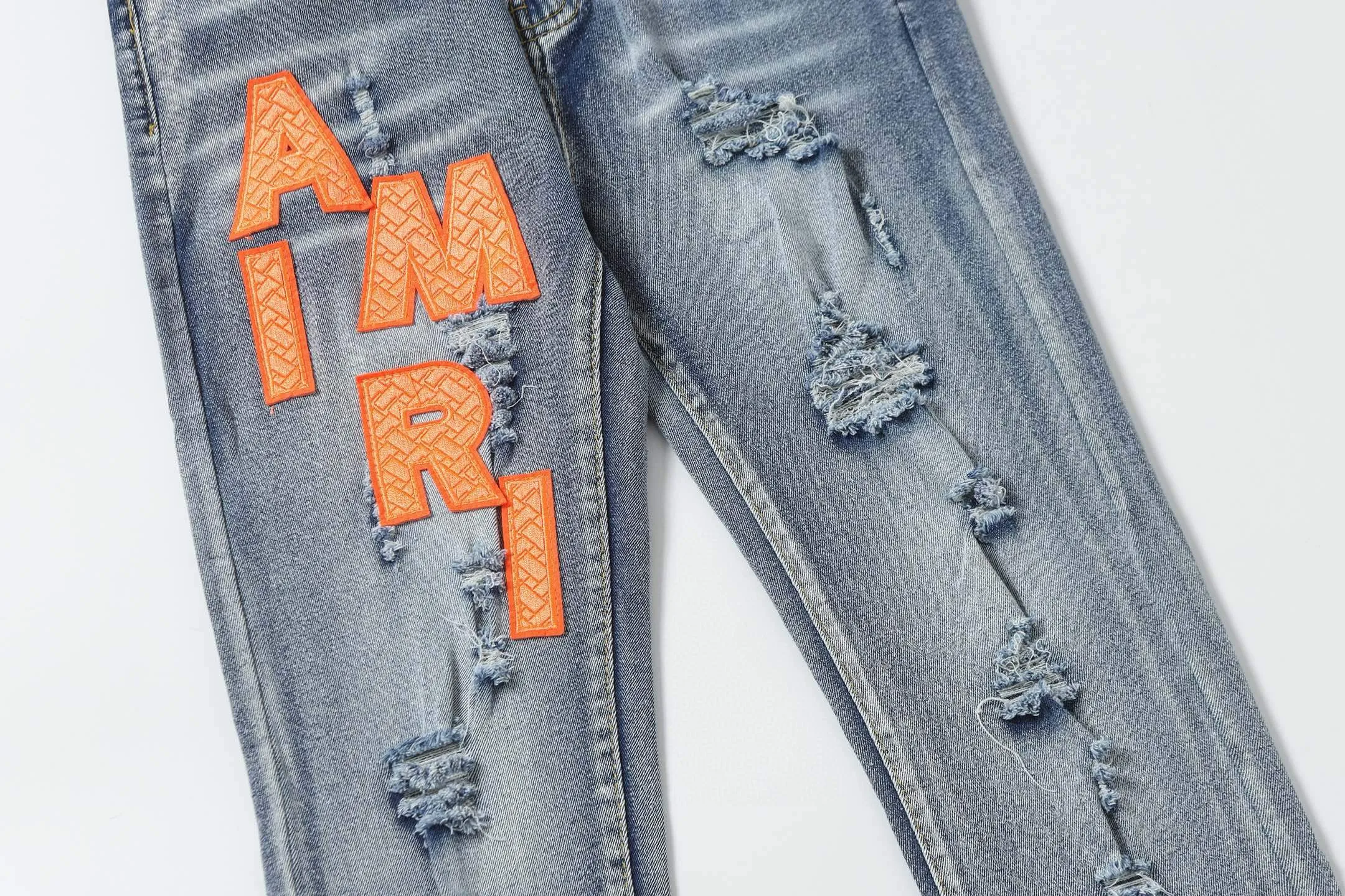 P270 AMIRI patch embroidery jeans trousers AMIRI high street basic ripped jeans trousers Color: Picture color Code number: 28-36