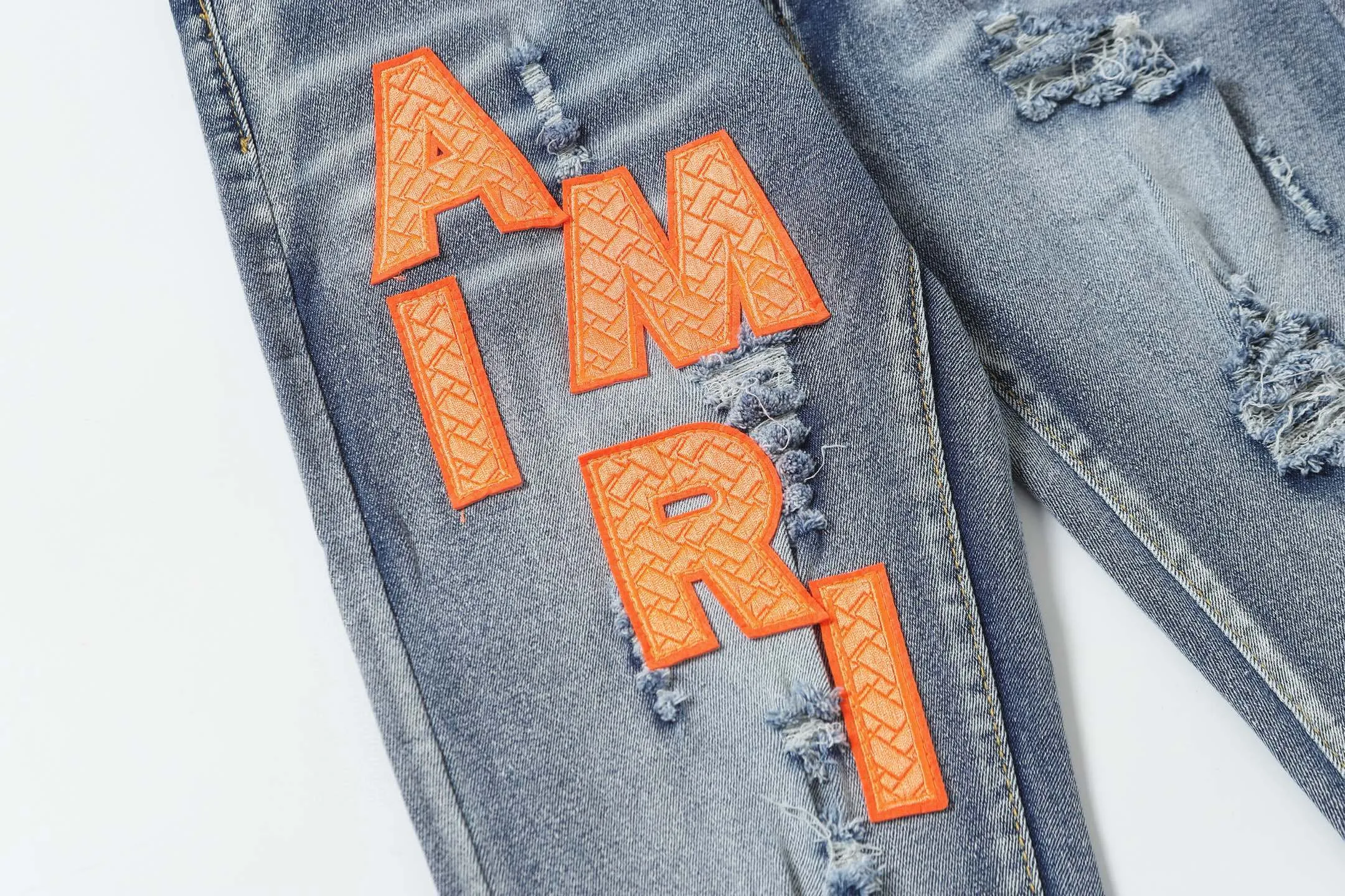 P270 AMIRI patch embroidery jeans trousers AMIRI high street basic ripped jeans trousers Color: Picture color Code number: 28-36