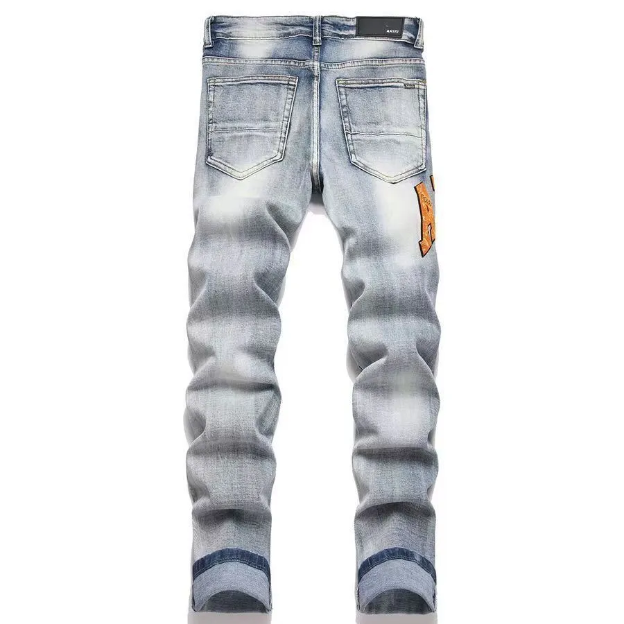 #M88 P168💰 AMIRI patch embroidery jeans trousers AMIRI high street basic ripped tight elastic jeans trousers amiri brand jeans break the production process and cutting of the original jeans, the fabrics are softer and more comfortable Hand-sewn collar label Customized logo buttons Genuine leather tag Color: Picture color Size: 30-32-34-36