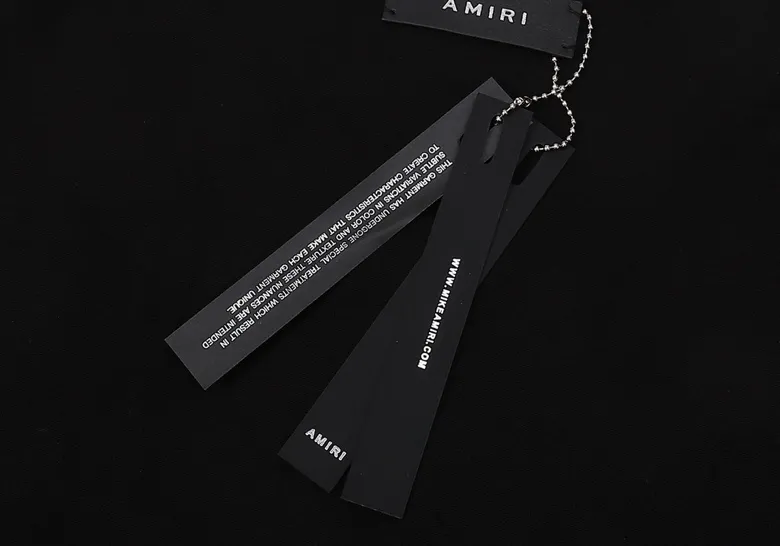 Style number: 667 P114 Fabric: 260g double yarn AMIRI 2025 spring and summer new logo round neck T-shirt high street men and women loose classic letter sword short sleeves Color: black white Size: S M L XL