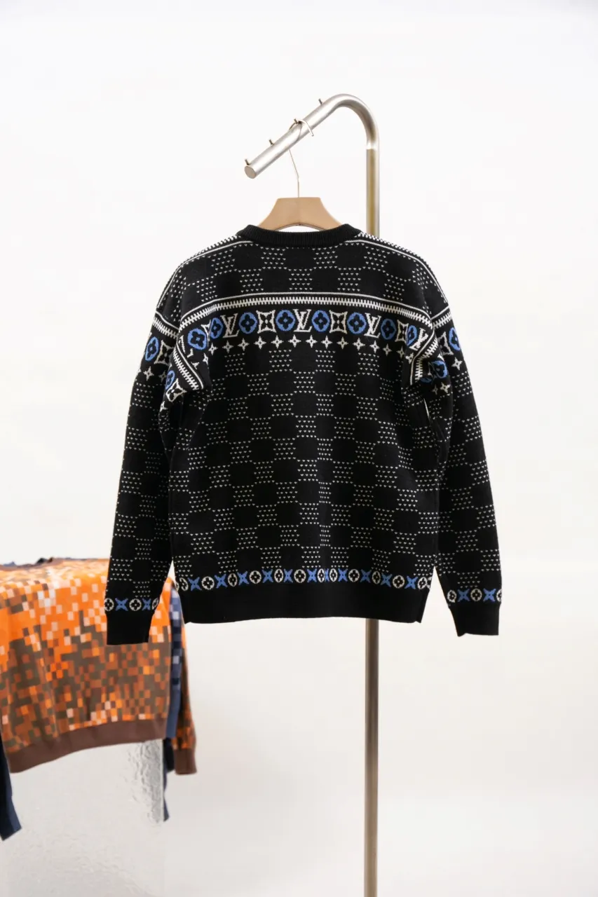 LV Jacquard Sheep Wool Pullover Sweater This pullover is made from responsibly sourced sheep wool. It outlines the classic pattern and the brand's logo jacquard texture on a deep background, and then reinvents the Fair Isle sweater with a soft dropped shoulder design. Wear it over a ski jacket or light up the campfire.  Standard fit All-over LV Fair Isle jacquard with Damier and Monogram details Vuitton logo jacquard in the center