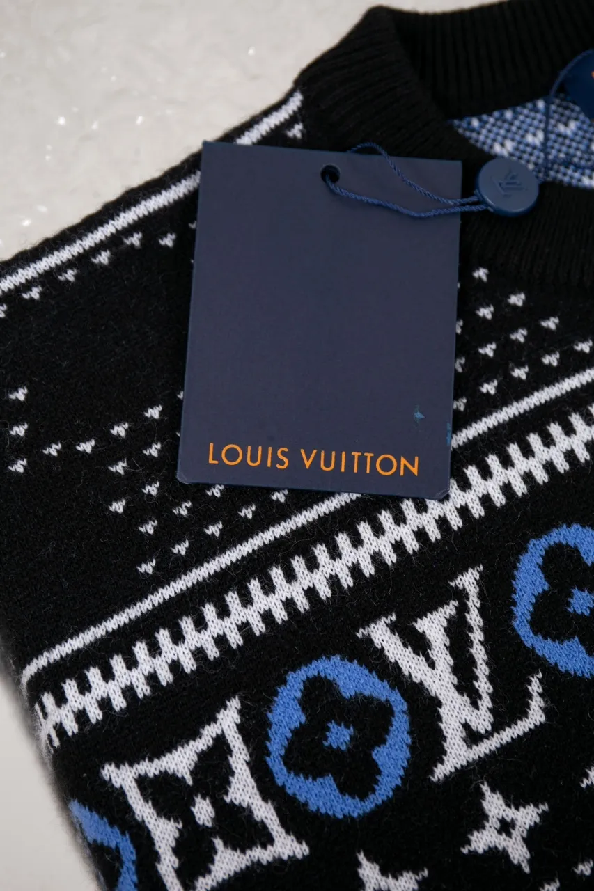 LV Jacquard Sheep Wool Pullover Sweater This pullover is made from responsibly sourced sheep wool. It outlines the classic pattern and the brand's logo jacquard texture on a deep background, and then reinvents the Fair Isle sweater with a soft dropped shoulder design. Wear it over a ski jacket or light up the campfire.  Standard fit All-over LV Fair Isle jacquard with Damier and Monogram details Vuitton logo jacquard in the center