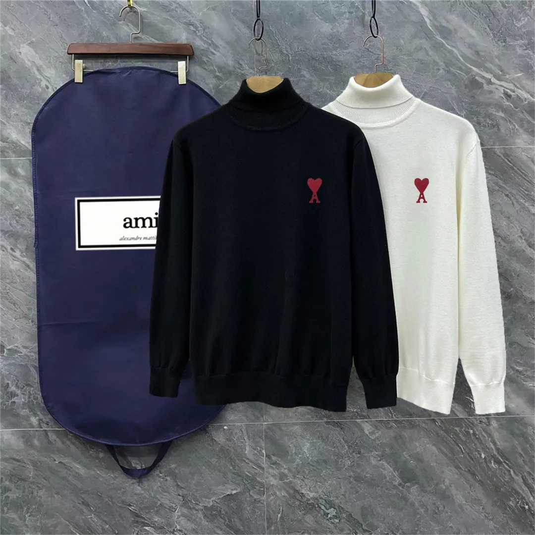 🅿️260 AMI AMI complete with 3 labels Logo embroidered turtleneck sweater Premium wool blended sweater High-end customized collection for men and women Affiliated to the brand's high-end main line Patented top-grade yarn blend Interprets conventional styles with innovation The fabric configuration is subversive The details are remarkable The most anticipated sweater in winter 24 Full of high-end sense The brand designated Zhejiang processing factory flows out Super cost-effective Meri wool yarn is of excellent quality. It feels super soft, delicate, soft, non-pilling and non-deforming. It is available at all major counters at the same time. It is a must-have product every year. The product seems simple, the process is extremely complicated, and the upper body is not picky. The upper body is extremely skin-friendly and comfortable. It can be worn close to the body with an outer jacket or as an outer layer. Color: Black White Size: M L XL 2XL 3XL