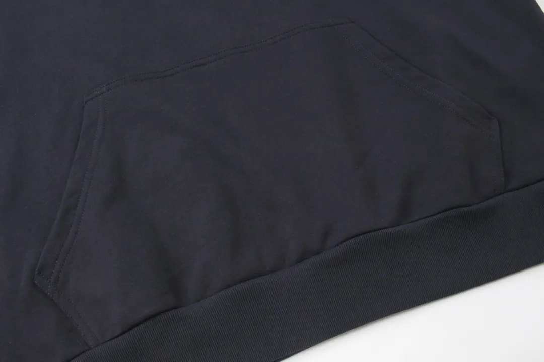 🅿️316 Detailed pictures [Top version. Official website quality] BALENCI*GA/Paris BALENCI*GA#2024 latest model, large letter LOGO icon embroidered hooded sweatshirt. Brick cabinet synchronization. Develop and develop genuine products at the first time. Embroidery. All colors are on the same board. Welcome to compare! The fabric is made of Paris ZP custom-woven and dyed cotton double-yarn large parka. The weight is 450 grams. The cloth surface is clean. The cloth pattern is clear. It is soft and comfortable. It has good color fastness and is not easy to change color. The threads are woven and dyed with no color difference. The embroidery is done using an imported Tajima embroidery machine, with a three-dimensional effect and clear lines. There are no burrs and miscellaneous threads, and the embroidery is of ultra-high craftsmanship. The version adopts OS loose shoulder design. Same style for men and women. Code: BL238006 Color: dark blue gray, white Size: XS S M L