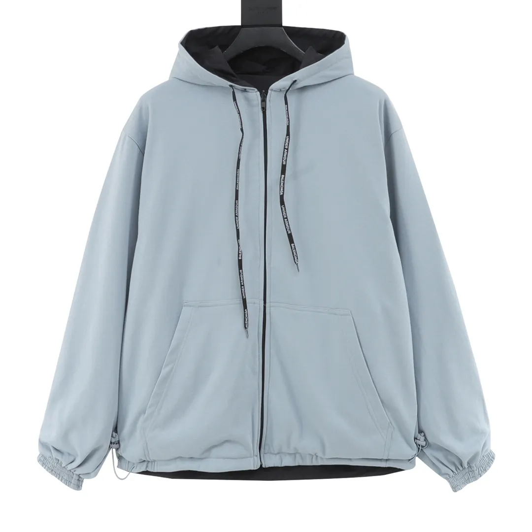 🅿️620 Balenciaga x Under Armor Balenciaga BLCG × UA 25SS cross-border co-branded haze blue reversible jacket Light luxury essential item for daily commuting for men and women Correct version Free comparison Detailed features · Customized matte Taslan jacket fabric · The entire fabric is pre-treated with a waterproof coating · OS ultra-loose silhouette design · The reverse side is made of custom-dyed 360g double-yarn pure cotton terry fabric · Custom-dyed cotton matte tatami embroidery thread · Imported Tajima high-speed embroidery machine high-density machine embroidery, three-dimensional and full · Side zipper pockets hooded design · The reverse side of the sweatshirt is designed with a sweatshirt rat bag · The cuffs are designed with elastic elasticity · The hem is designed with elastic spring buckles to tighten the waist · Open mold customization hardware zipper spring buckle Customized logo hood cord · Zippered pockets on the side of trousers · Three-grade polyester bird’s eye mesh lining · Original main mark washed tag packaging Color: Black Size: 46-52