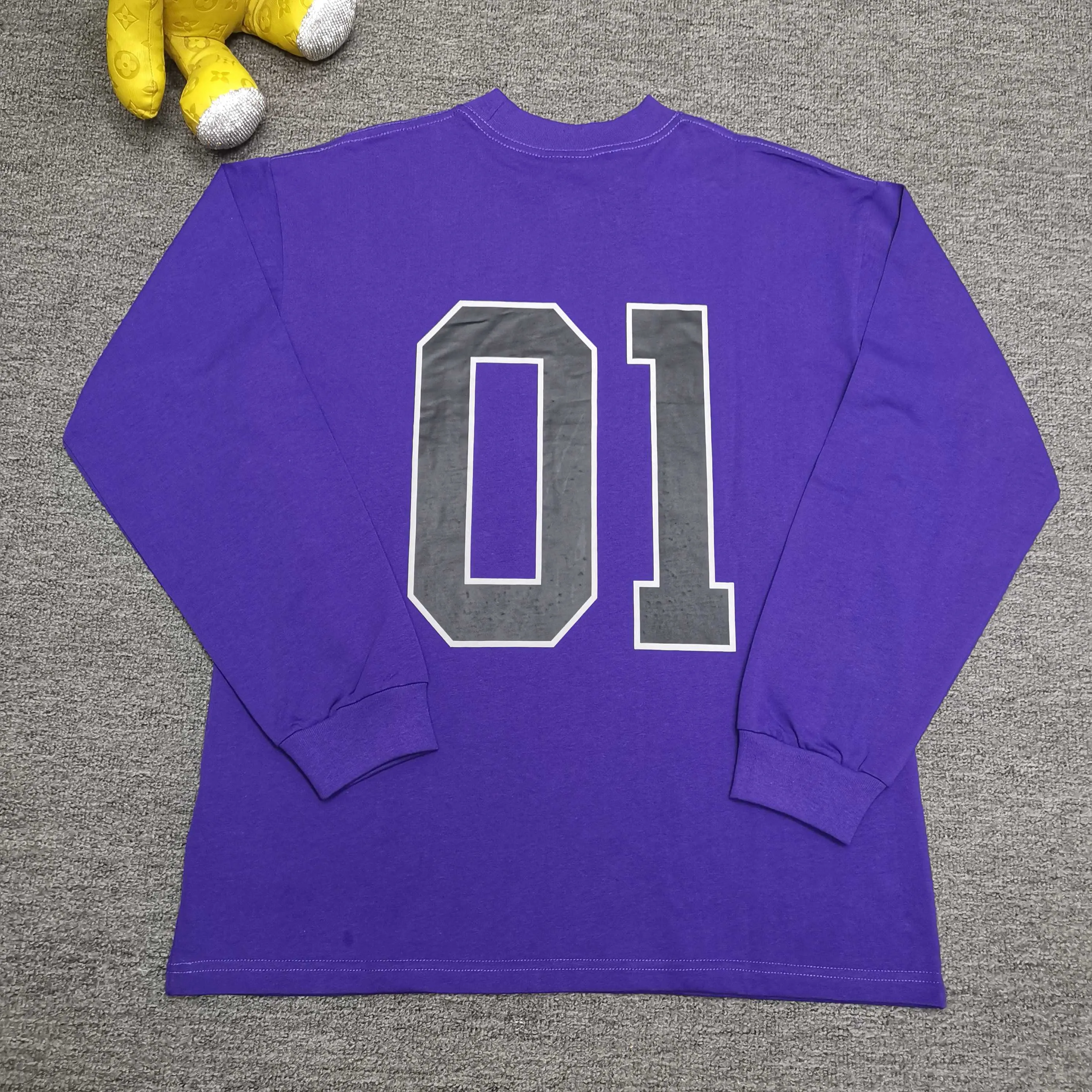[Top version. Official website quality] BALENCI*GA/Paris.SS25 latest basketball uniform embroidered printed long-sleeved T-shirt. The front embroidery is embroidered and printed using a Tajima computer embroidery machine, the lower left corner is stamped, and the back piece is printed. Brick cabinets are synchronized. Genuine products are developed at the first time. The fabric is made of Paris ZP custom-woven and dyed cotton double yarn. Weighing 260 grams, the cloth surface is clean. The cloth pattern is clear, soft and comfortable. The threads are dyed with no color difference. The printing uses environmentally friendly imported materials, the letters are clear and the effect is three-dimensional. The version adopts OS loose shoulder design. Same style for men and women. Color: black, white, purple, orchid. Size: XS S M L P350