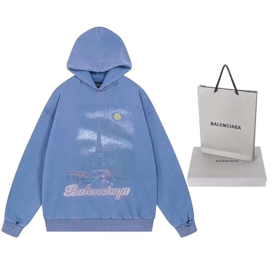🅿️370 real photos [Top version. Official website quality] BALENCI*GA/Paris. 2024 latest autumn and winter Paris Eiffel Tower direct-injection white ink gradient color printing washed and worn hooded sweatshirt. Overweight craftsmanship, brick cabinet synchronization. ⚠️Distinguish the market currency, genuine product development, welcome to compare! The weight is 460 grams, ground. The hand-painted is consistent with ZP, and the printing uses Kornit digital direct printing. The garments are washed and worn. The whole piece is designed with extra heavy craftsmanship. Comparisons welcome. The version adopts OS loose shoulder design. Same style for men and women. Code: BL238919 Color: pink, washed blue Size: XS. S. M. L