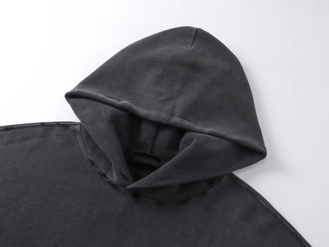 🅿️320 real photos [Top version. Official website quality] BALENCI*GA/Paris. 53rd season Balenciaga New. Vintage high-end limited edition joint hooded sweatshirt. The pattern on the front is damaged by the direct-injection printing. The ready-made garments are washed and worn. SS24 new model. Brick cabinet synchronization. Genuine product developed at the first time, please print and compare! The fabric is made of Paris ZP custom-woven and dyed cotton sweatshirt. Weighing 460 grams, the cloth surface is clean. The cloth pattern is clear, soft and comfortable. The threads are dyed with no color difference. The printing uses environmentally friendly imported materials and self-inking direct injection. The pattern letters are clear and the effect is three-dimensional. The entire garment is washed, distressed and worn. The version adopts OS loose shoulder design. Same style for men and women. Code: BL238935 Color: washed black Size: XS S M L