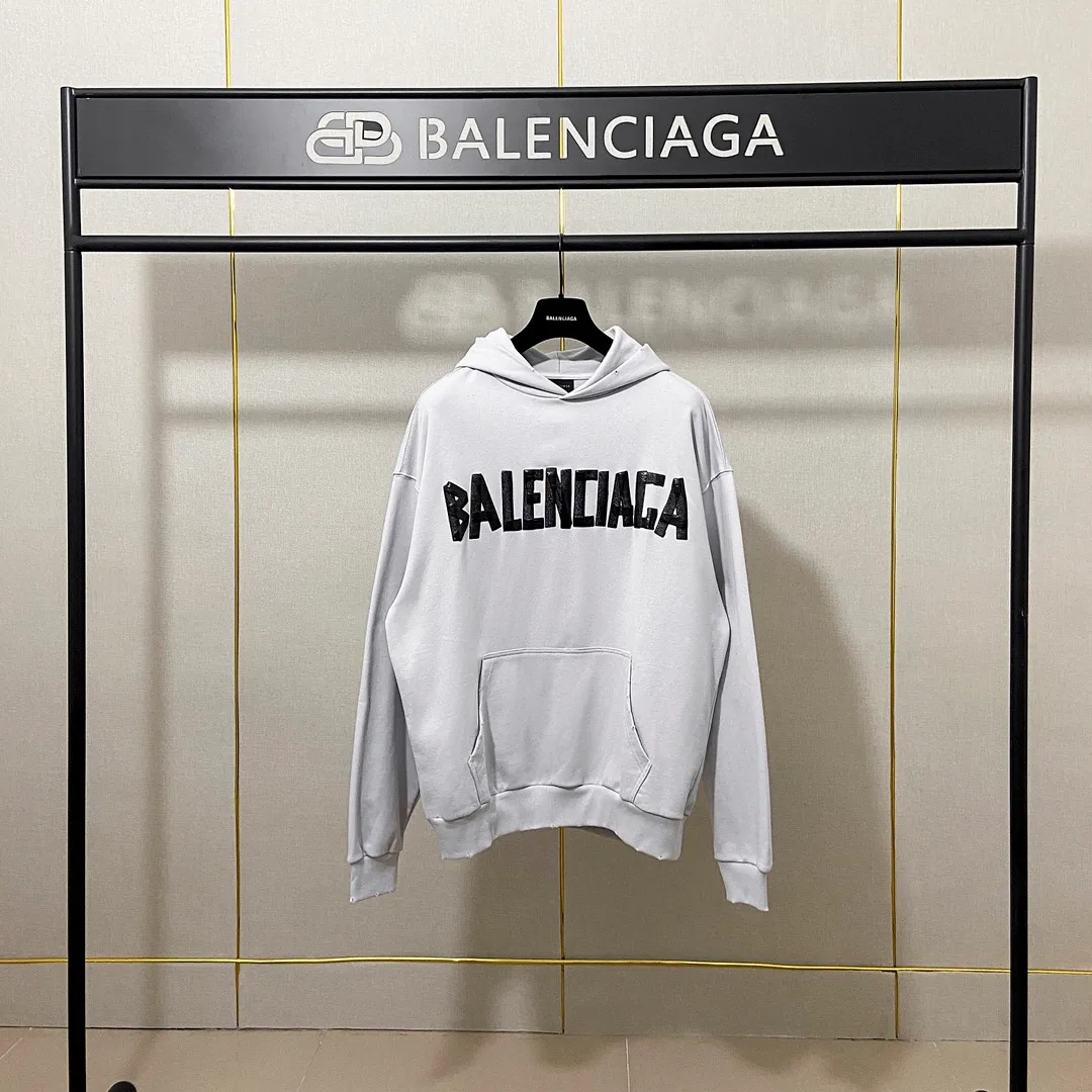 🅿️310 7110# Real photos Top version [BALENCIA*GA] Official website quality Paris new tape series hooded sweatshirt OS version Loose dropped shoulders Uniform style for men and women Fabric: 480g 100% cotton terry sweater Technology: Front and back printing Garment wash Worn Distressed Fixed color Color: black blue off-white Size: XS S M L