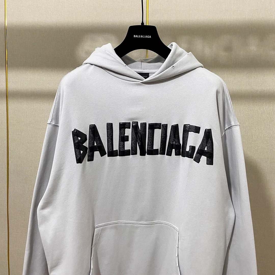 🅿️310 7110# Real photos Top version [BALENCIA*GA] Official website quality Paris new tape series hooded sweatshirt OS version Loose dropped shoulders Uniform style for men and women Fabric: 480g 100% cotton terry sweater Technology: Front and back printing Garment wash Worn Distressed Fixed color Color: black blue off-white Size: XS S M L